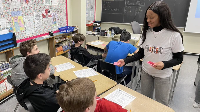 Nursing student Chesca Obodoechina helps Walkerville Collegiate Institute students identify coping strategies during a session on mental wellness