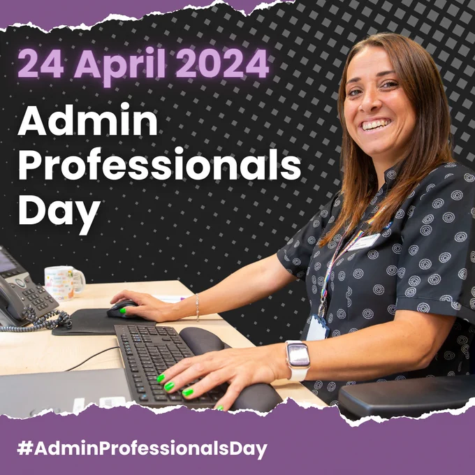 Image of an admin lady sitting at her desk working on her computer