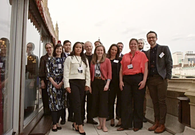 The team of staff of the DHLP, at the cohort celebration by the River Thames