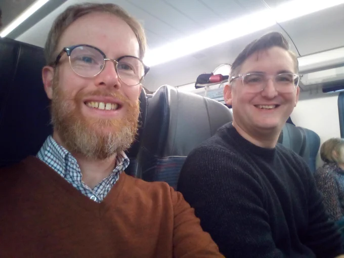 Photo of Chris and James on train
