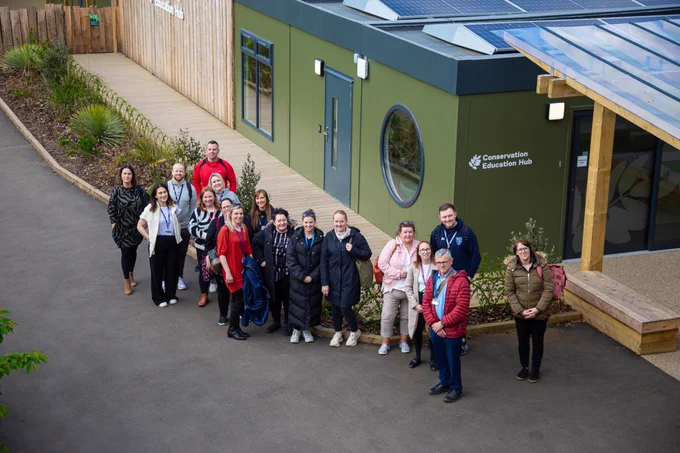 A group of teachers stood outside our Conservation Education Hub.
