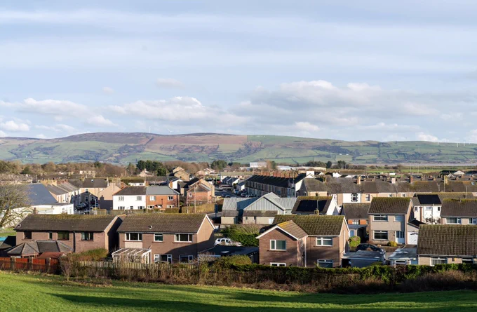 Views over Millom. Hills in the background, houses in the foreground.