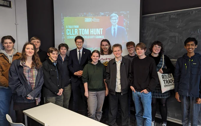 Members of Sheffield Labour Students standing besides Leader of Sheffield City Council, Cllr Tom Hunt