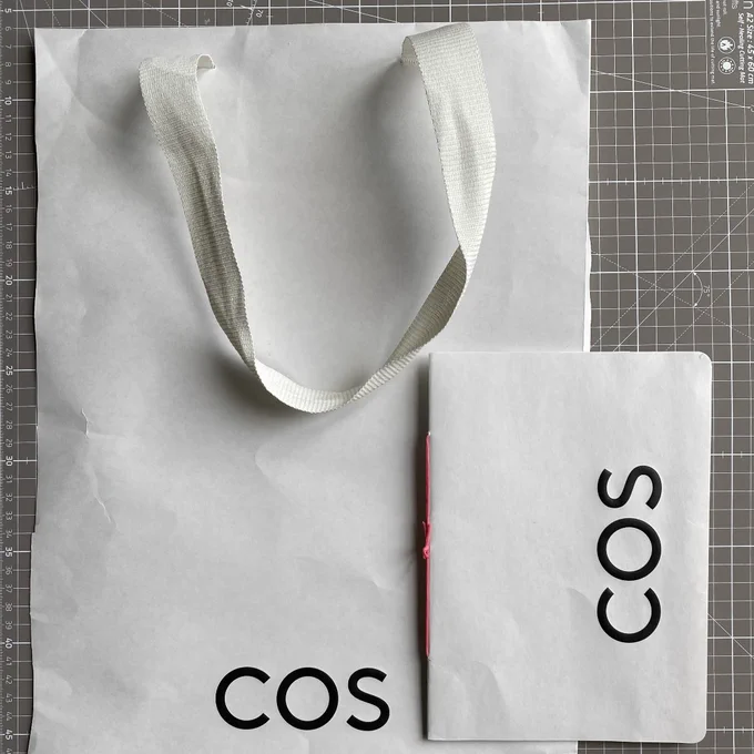 Book with handmade cover made from a bag.