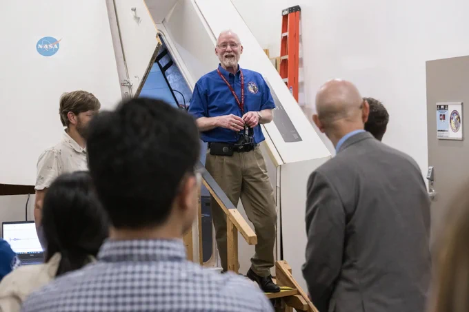 Chris Allen of NASA’s Human Health and Performance Directorate speaks with representatives from commercial companies during a tour of the Acoustics and Noise Control Laboratory at the Johnson Space Center in Houston. The Acoustics Lab ensures safe, healthy, and habitable vehicle acoustic environments. Participants also had the opportunity to visit the Lighting Lab, Center for Design and Space Architecture, and Audio Development Lab.
NASA/James Blair