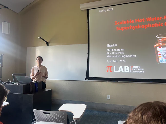 Zhen Liu presenting on her work at a special Research Excellence Award seminar