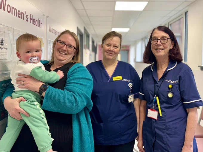 Baby Ellis, mama Julie, midwife Amanda and midwife Ann
