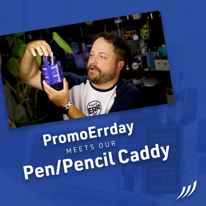 Brandon from the PromoErrday video series holds up a blue pen caddy with a calendar design.