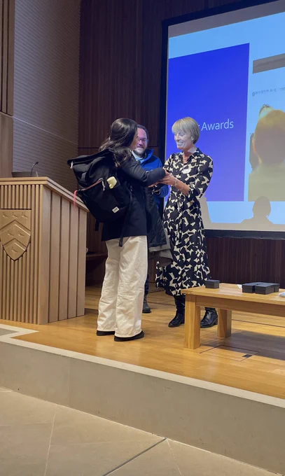 Galit Geulayov receiving the best poster award from Elizabeth Rapa