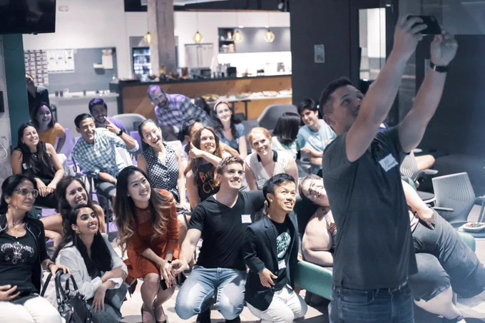 a photo of Joe Vasquez taking a group selfie at the Diversability entrepreneurship event in 2019