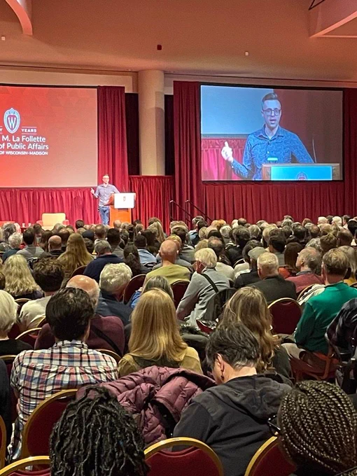 Ezra Klein presents to an audience at the Monona Terrace.