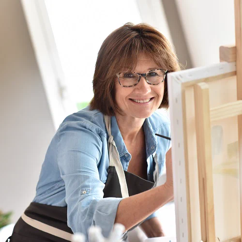 Woman at an easel drawing or painting