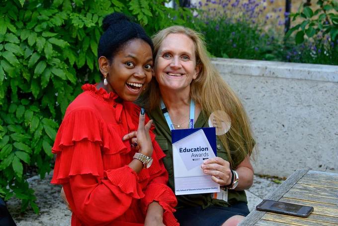 student and staff member celebrating at UCL Education Awards