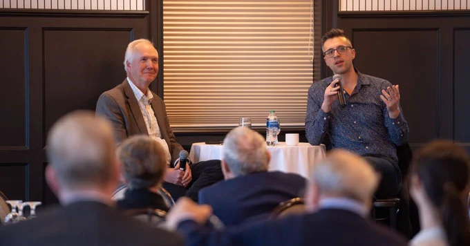 Jeff Mayers and Ezra Klein field questions from policymakers at the Madison Club