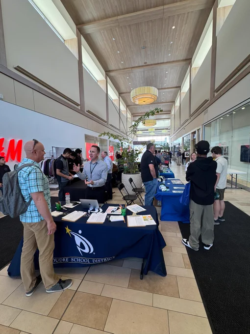 Tables set up at Foothills Mall for the high school senior, ASCENT and ACE student hiring fair.