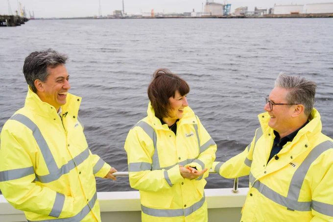 Ed Miliband, Rachel Reeves and Keir Starmer on a boat in a Teesside Port.