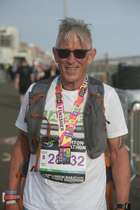 David Plews plus finishers Medal for Brighton Marathon