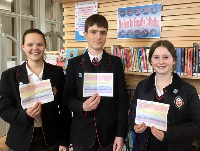 Pupils in the Library having completed their Reading Challenge