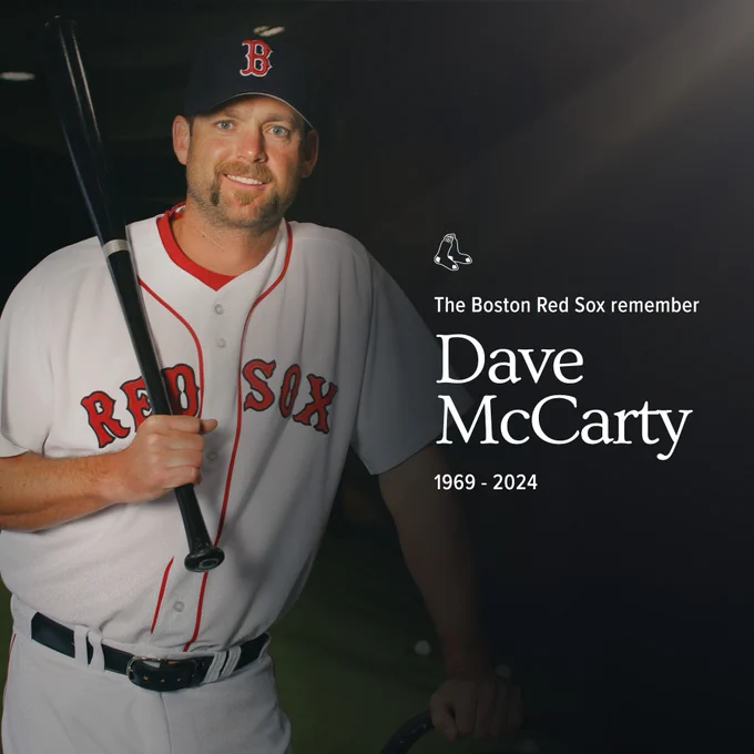 A photo of Dave McCarty wearing Red Sox home white uniform and smiling with a bat over his shoulder reads "The Boston Red Sox Remember Dave McCarty. 1969-2024" 