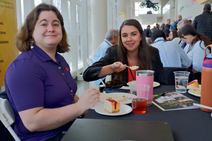 Dr. Jenny Brown (left) and Libby Flanagan enjoying food at the conference.