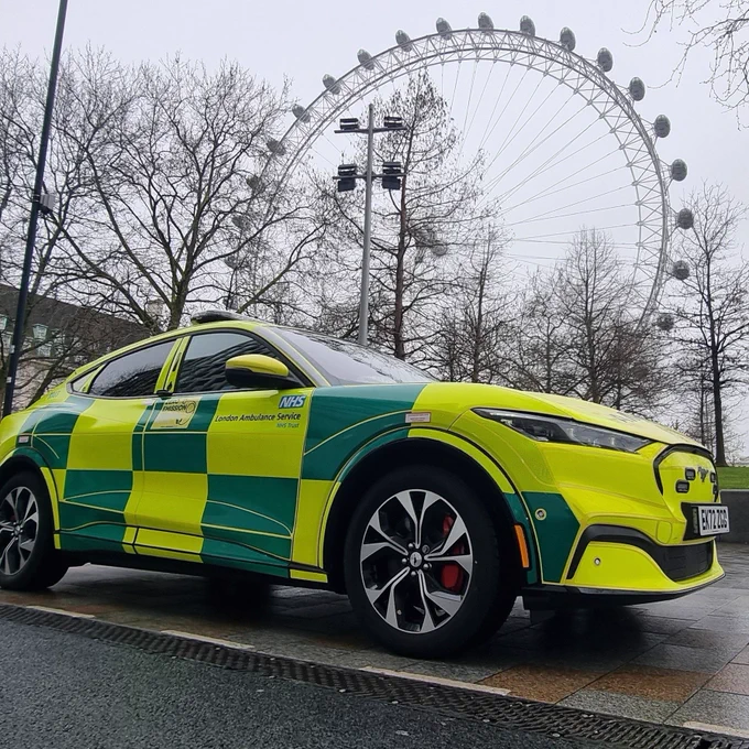 Image shows a London Ambulance Service fast-response car parked up in front of the London Eye.