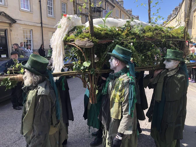 Mourners at the Funeral For Nature held in Bath carry a funeral bier with a statue of Mother Earth.
Photo credit: Gareth Morris