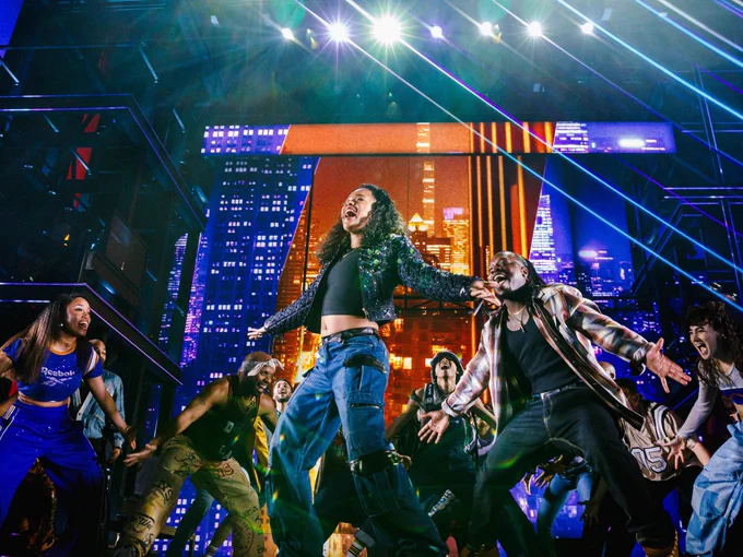 On-stage scenes from the Broadway Musical Hell’s Kitchen featuring actors singing dancing with street style clothes and colorful lights.