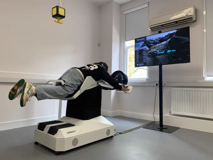 Open Day April 2024 at University of Buckingham. A prospective student experiencing virtual flying on our Birdly machine.