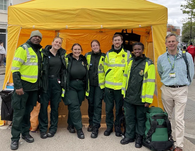 London Ambulance staff with CEO Daniel Elkeles at a marathon treatment centre.