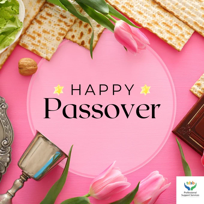 Happy Passover image in pink adorned with pink tulips, matzah crackers, a kiddish cup and a walnut.