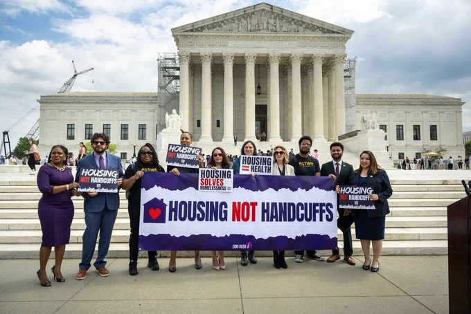 Congresswoman Bush, Representatives Maxwell Frost, Delia Ramirez hold Housing NOT Handcuffs banner in front of Supreme Court
