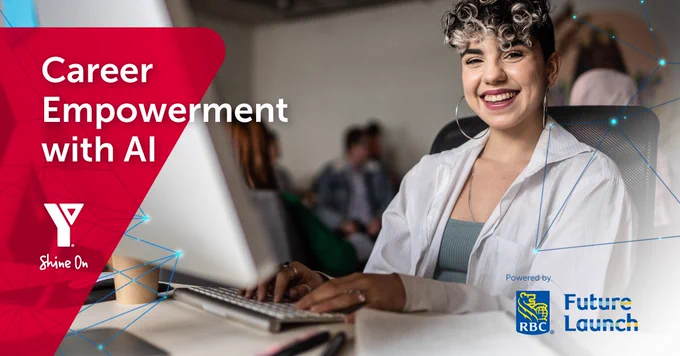 Person smiling at their desk