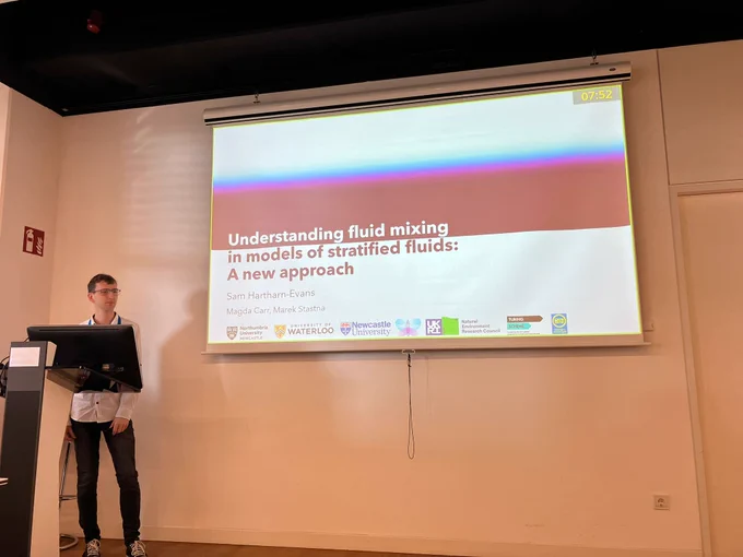 Photo of Sam presenting