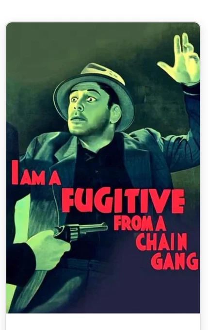 “I am a fugitive from a chain gang” movie poster. Man held up at gunpoint. 