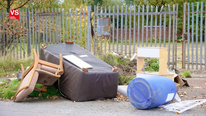 Photo of rubbish and old furniture outside in a residential area