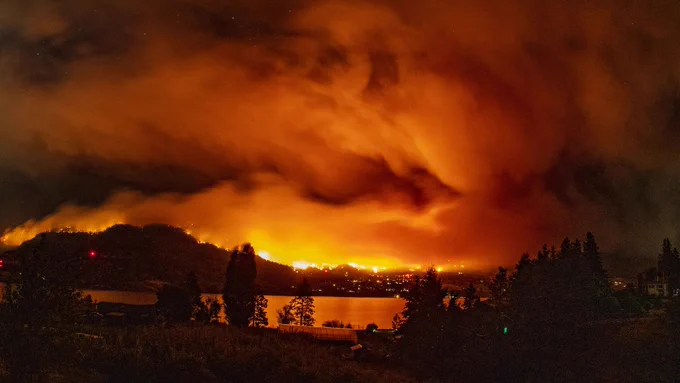 A wild fire burning and spreading in British Columbia. 