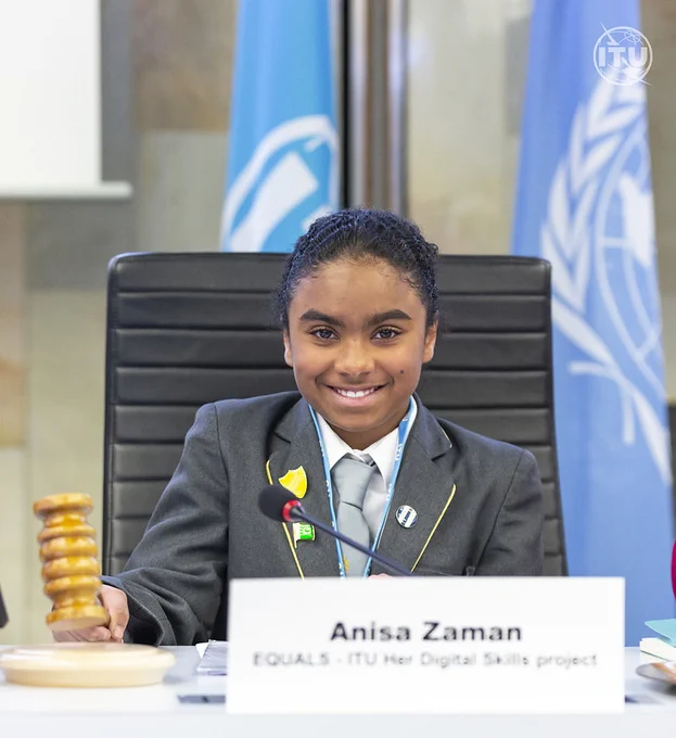 photo of Anisa Zaman, co-moderating our Girls in ICT Day intergenerational dialogue at HQ, with gavel to start the session