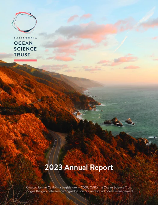 Cover of 2023 Annual Report from California Ocean Science Trust. The cover has an image of a winding road along the coast. To the left are mountains in golden sunset light. To the right is the Pacific Ocean.