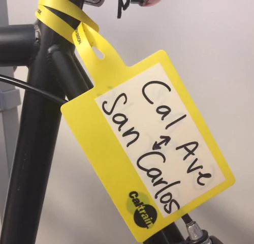 A Caltrain bike tag showing origin and destination.