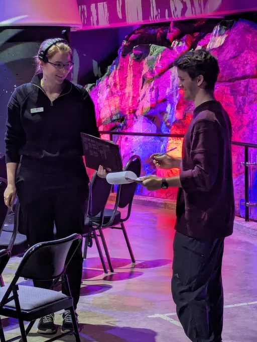Science Communication students and staff managing the stage. 