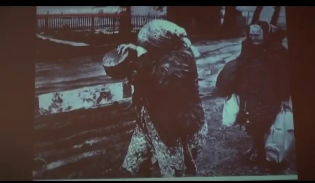 Residents who leave for “ 'Interim' Evacuation Order”, while seeing through the situation, in tears. (a cat that couldn't be left behind is held in the woman's arm)