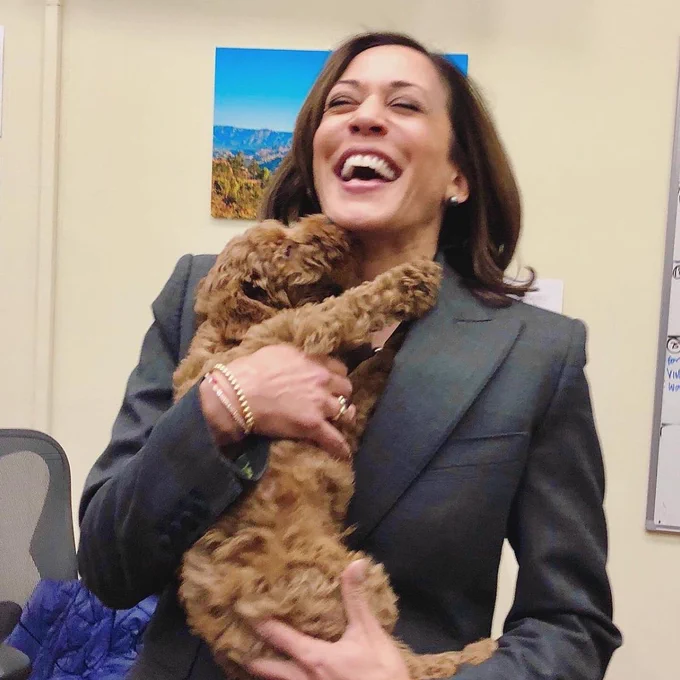 A picture of Kamala Harris with a dog 