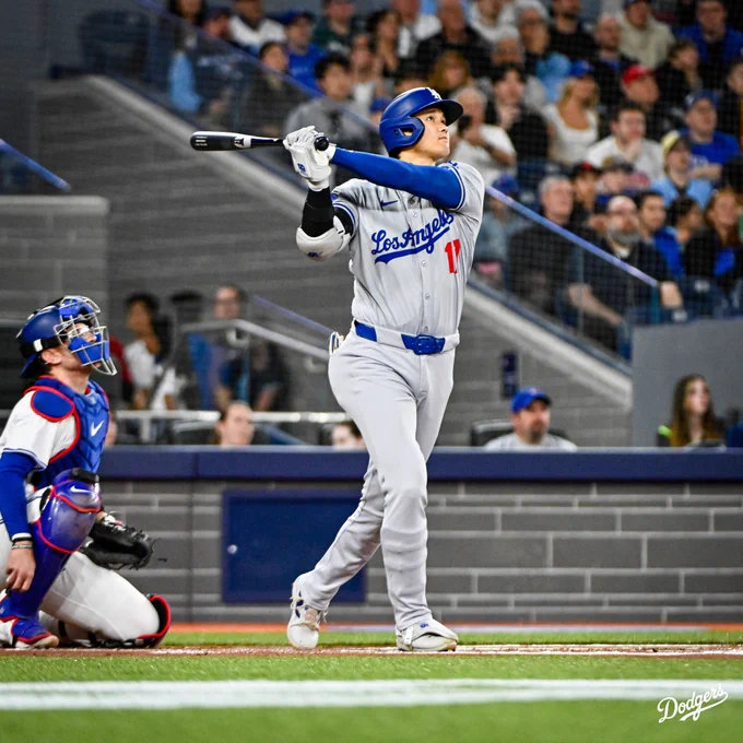 Shohei Ohtani looks up after hitting a home run.