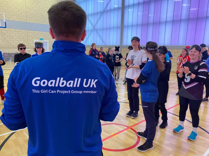 Camera from behind me whilst I’m wearing a light blue This Girl Can Project Group jacket. I’m speaking to all players, coaches and officials as we kick off the competition!