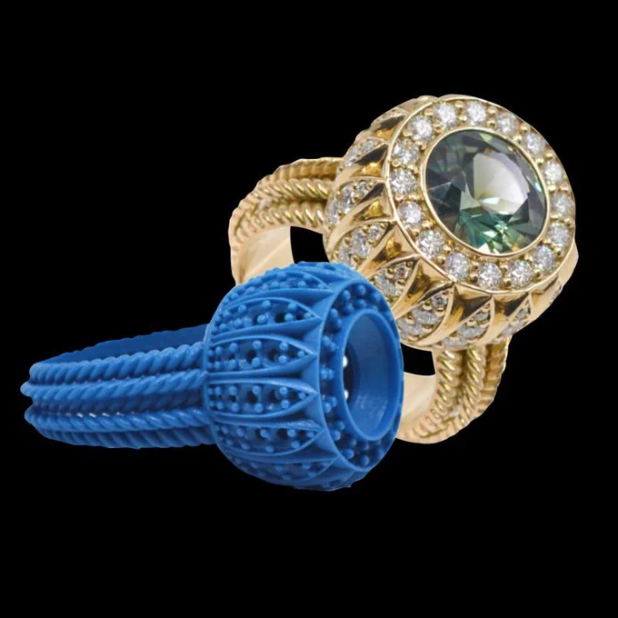 A 3D printed model and the final ring. Photo via Solidscape.