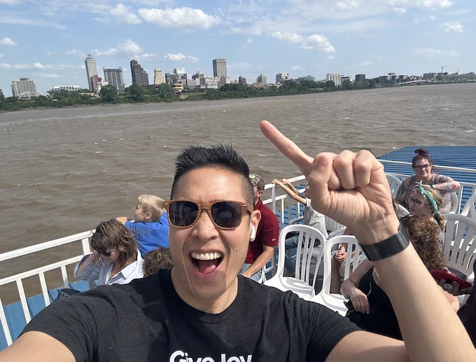 Selfie on the Memphis Riverboats and pointing to Memphis Downtown from afar!