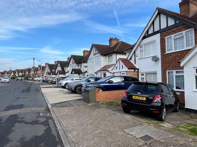 A street dominated by off-street parking. No space for trees.