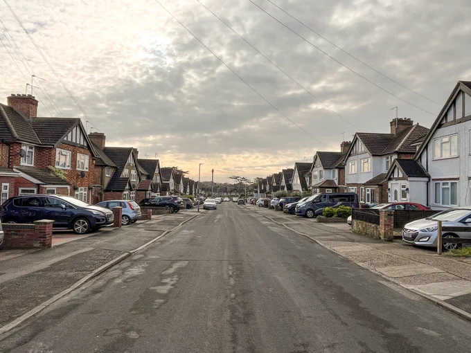 A street dominated by off-street parking. No space for trees.
