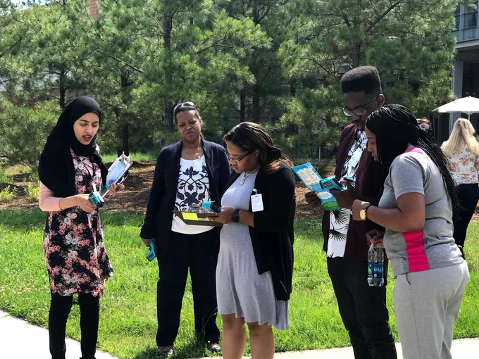 A group of educators take part in an outdoor activity as part of the GLOBE ENGAGE program