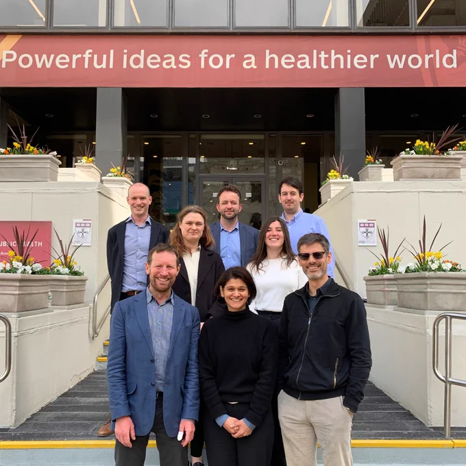 Symposium speakers in front of Harvard T.H. Chan School of Public Health